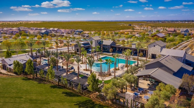 birds eye view of property with a residential view