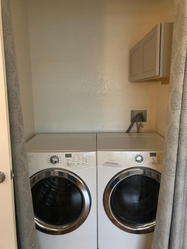 laundry room featuring washer and dryer