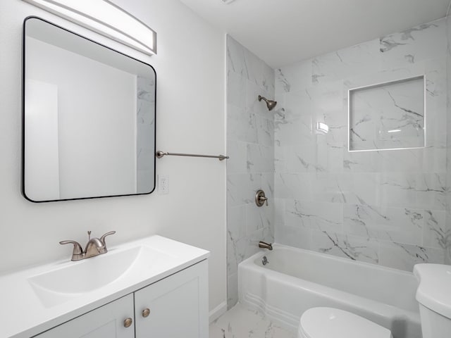 full bath with shower / bath combination, toilet, marble finish floor, and vanity