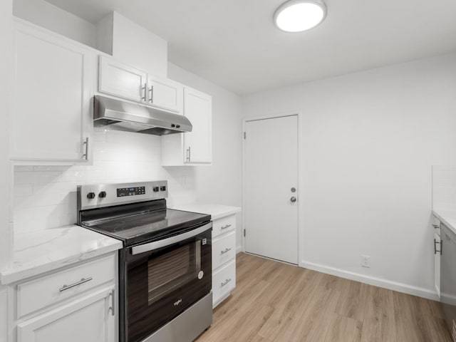 kitchen with light wood-type flooring, stainless steel range with electric stovetop, under cabinet range hood, tasteful backsplash, and white cabinets