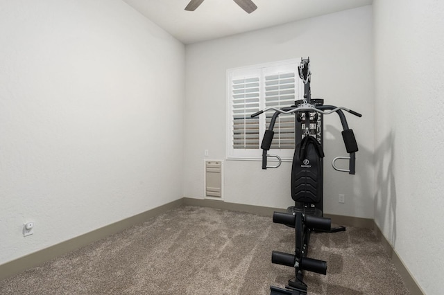 workout area with baseboards, carpet floors, and ceiling fan