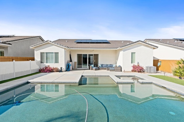 view of pool featuring a patio, a fenced in pool, an in ground hot tub, a fenced backyard, and an outdoor hangout area