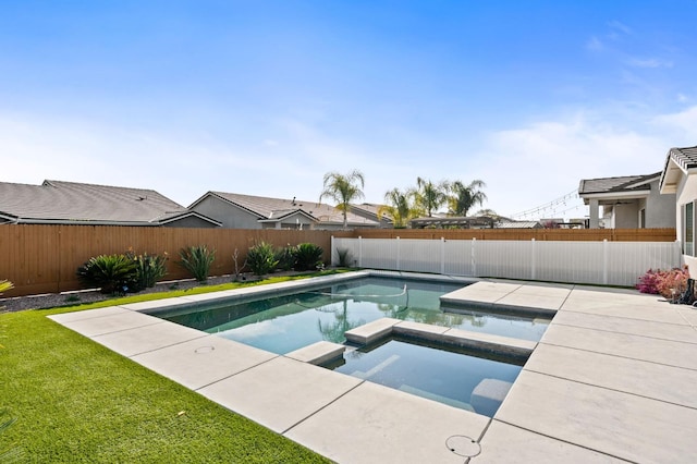 view of swimming pool featuring a patio area, a fenced backyard, and a pool with connected hot tub