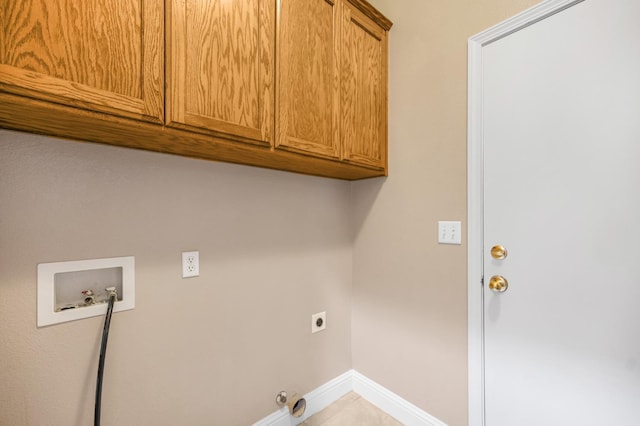 2565 Powers Ave, Clovis, CA 93619 - washroom with electric dryer hookup, washer hookup, gas dryer hookup, baseboards, and cabinet space