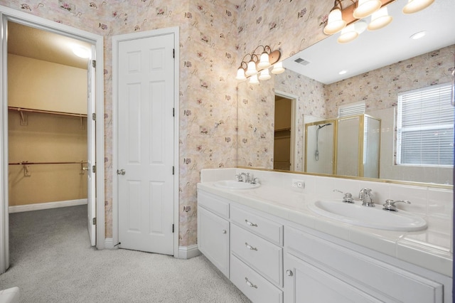 2565 Powers Ave, Clovis, CA 93619 - bathroom featuring a stall shower, wallpapered walls, a sink, and visible vents