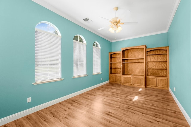 2565 Powers Ave, Clovis, CA 93619 - interior space featuring crown molding, light wood-style flooring, a ceiling fan, and baseboards