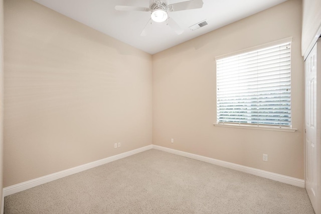 2565 Powers Ave, Clovis, CA 93619 - unfurnished room featuring visible vents, baseboards, a ceiling fan, and carpet floors