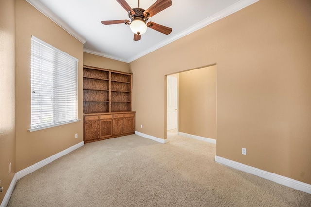 2565 Powers Ave, Clovis, CA 93619 - spare room with crown molding, ceiling fan, baseboards, and light carpet