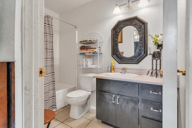 bathroom with vanity, tile patterned floors, toilet, and shower / bath combo