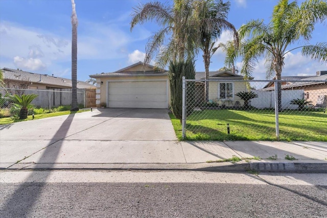 view of front of home featuring a garage, concrete driveway, a front lawn, and fence