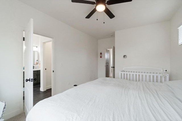 bedroom featuring baseboards and ceiling fan