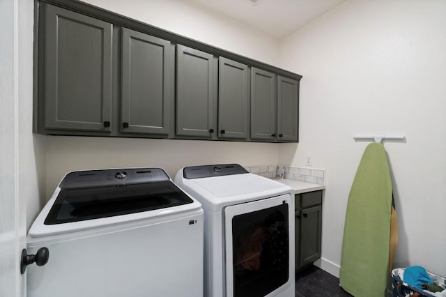 laundry area with cabinet space and washing machine and dryer