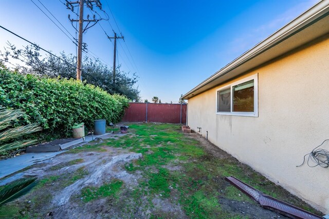 view of yard featuring fence