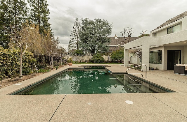 view of pool with a patio area, a fenced in pool, and a fenced backyard