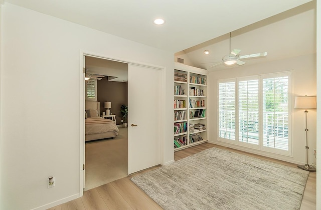 sitting room with visible vents, ceiling fan, lofted ceiling, recessed lighting, and wood finished floors