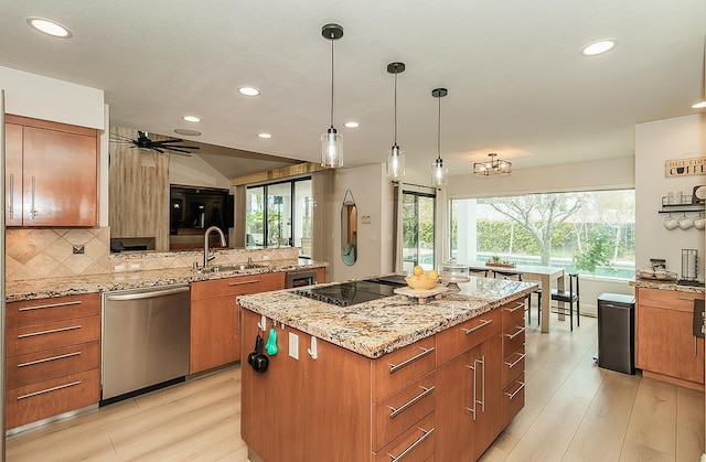 kitchen featuring a kitchen island, dishwasher, brown cabinets, black electric cooktop, and a sink