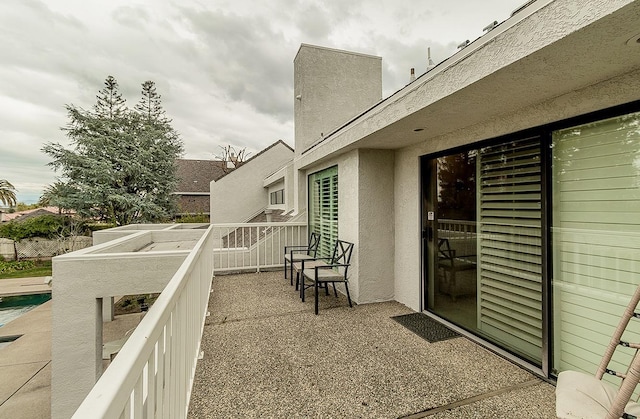 view of patio with a balcony