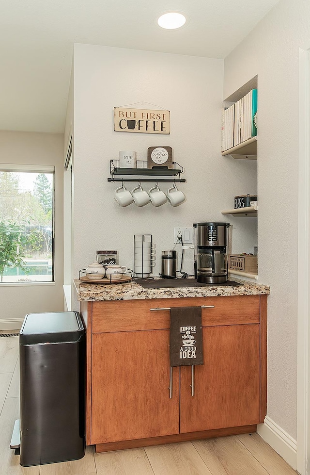 bar featuring baseboards