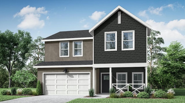 view of front of home with stucco siding, an attached garage, and driveway