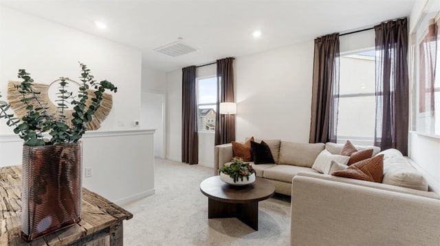 1158 Granite Dr W Unit 66, Madera, CA 93636 - living room featuring light carpet and recessed lighting