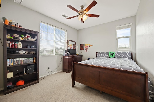 1410 Azalea St, Kingsburg, CA 93631 - bedroom with multiple windows, light carpet, and ceiling fan