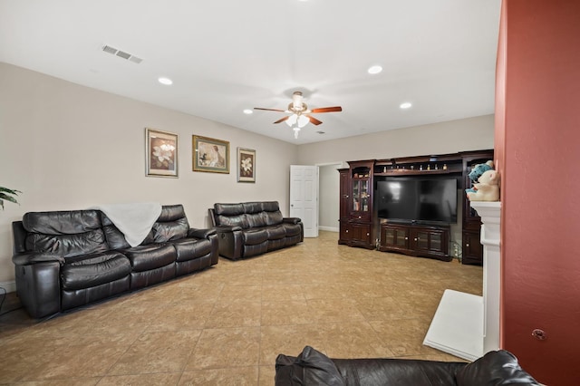 living room with recessed lighting, visible vents, and ceiling fan