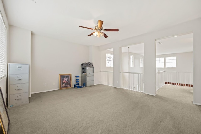 1410 Azalea St, Kingsburg, CA 93631 - unfurnished living room featuring a ceiling fan and carpet floors