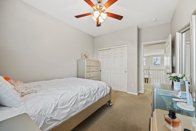 1410 Azalea St, Kingsburg, CA 93631 - bedroom featuring light carpet, a closet, and ceiling fan