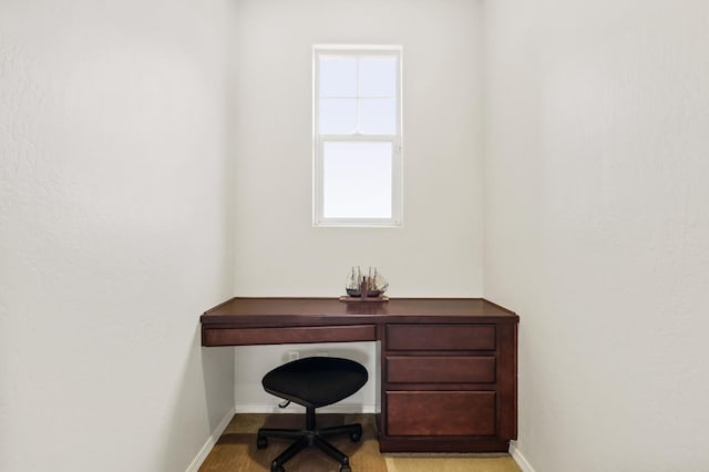 office space featuring baseboards