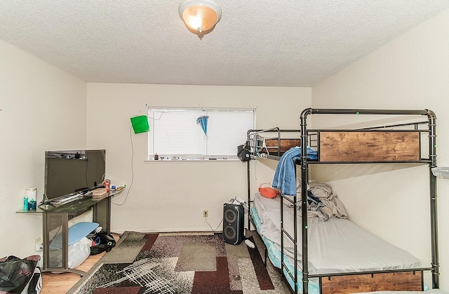 bedroom featuring a textured ceiling