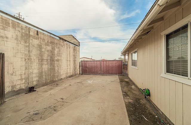 exterior space featuring a patio and fence