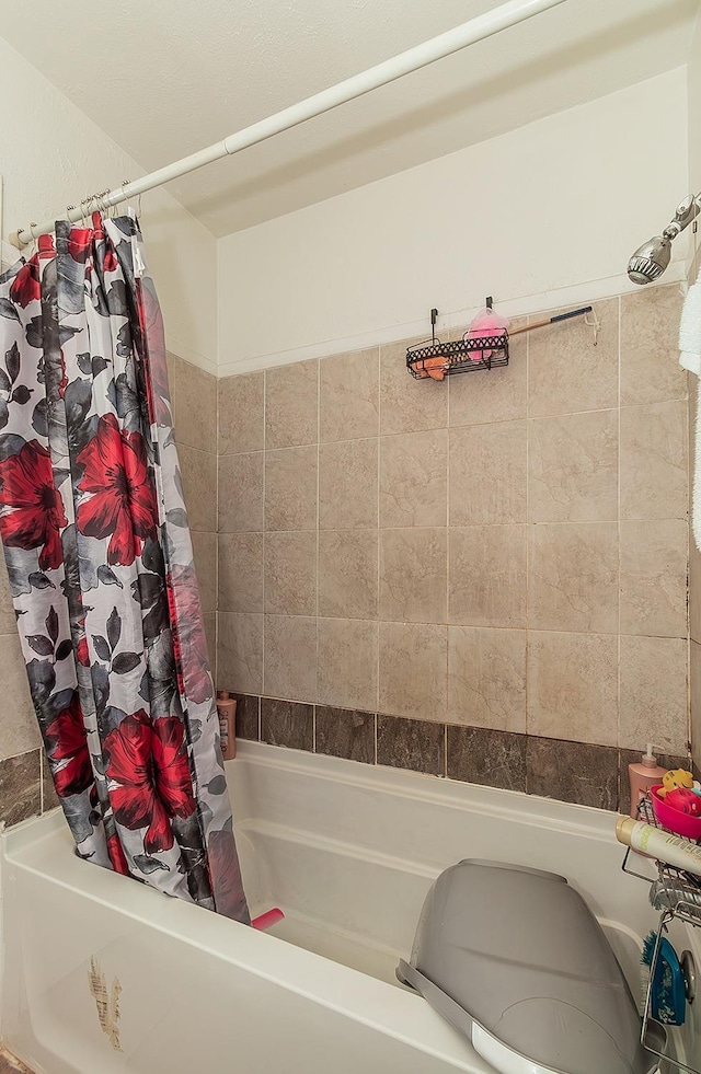 full bath featuring shower / bath combination with curtain