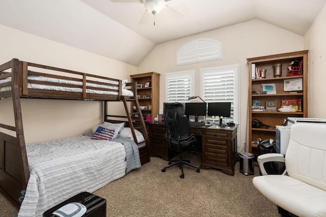 bedroom with lofted ceiling and carpet