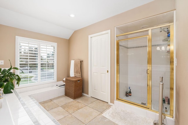 full bath featuring tile patterned floors, recessed lighting, a stall shower, and lofted ceiling