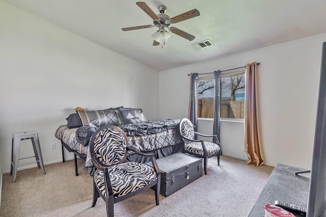 bedroom featuring carpet flooring, a ceiling fan, and visible vents