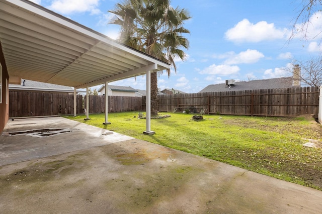 exterior space featuring a patio area and a fenced backyard