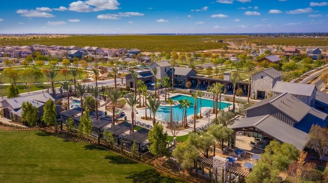 birds eye view of property with a residential view