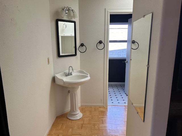 bathroom with baseboards