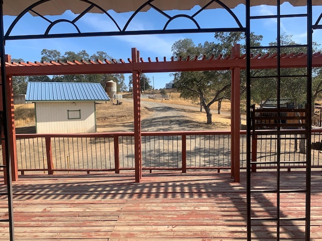 deck with an outbuilding