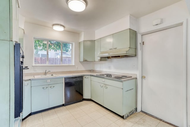 kitchen with a sink, light countertops, electric stovetop, black dishwasher, and under cabinet range hood