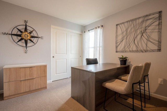 office area with carpet flooring and baseboards