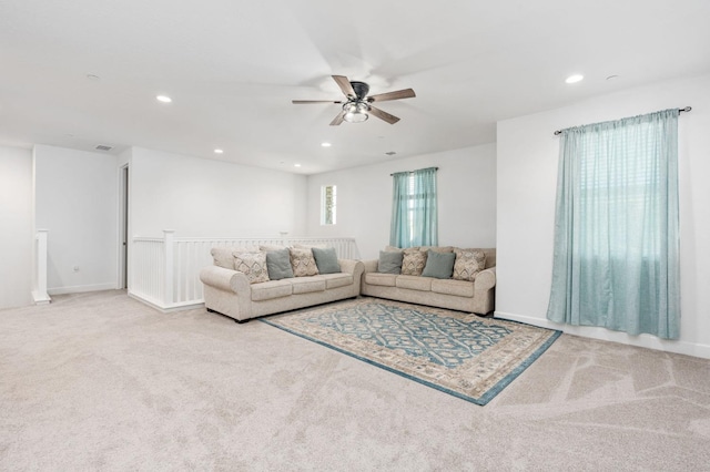 living room with a ceiling fan, recessed lighting, carpet, and visible vents