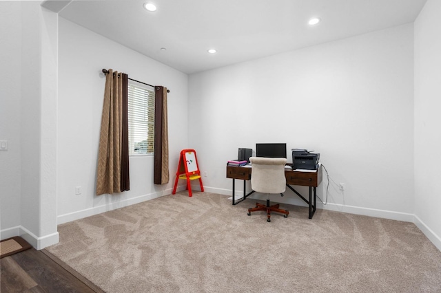 carpeted office space featuring recessed lighting and baseboards