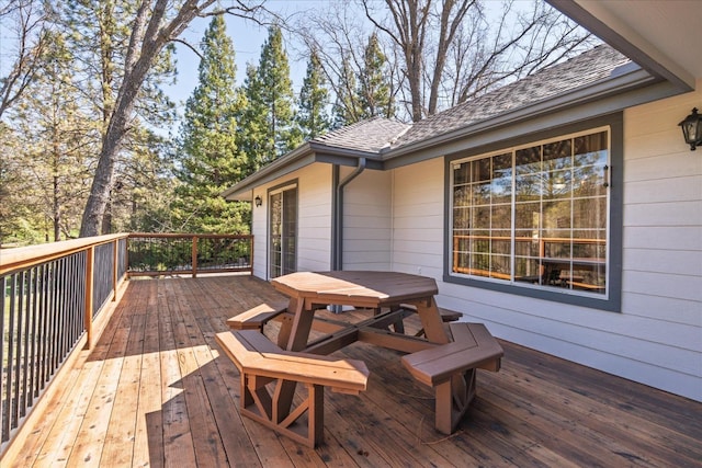 deck with outdoor dining space