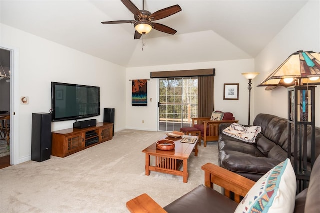 living room featuring baseboards, a ceiling fan, carpet flooring, and vaulted ceiling