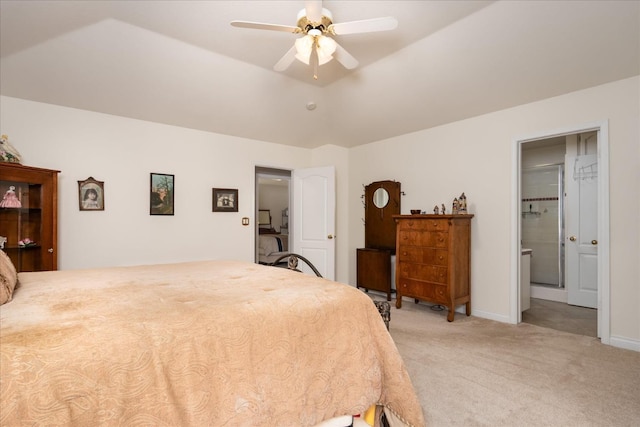 bedroom with light colored carpet, ensuite bath, baseboards, and ceiling fan