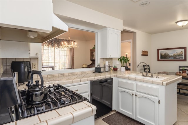 kitchen featuring a sink, black dishwasher, a peninsula, white cabinets, and exhaust hood