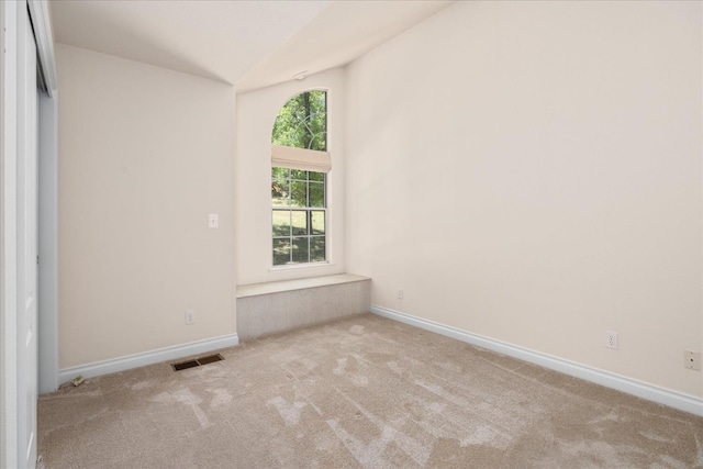 46055 Sutton Dr, Oakhurst, CA 93644 - empty room featuring carpet flooring, lofted ceiling, and baseboards