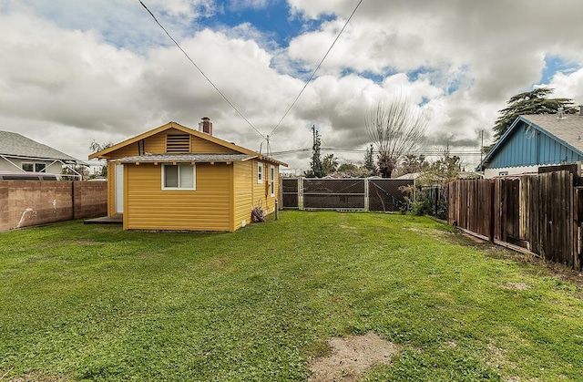 view of yard with a fenced backyard