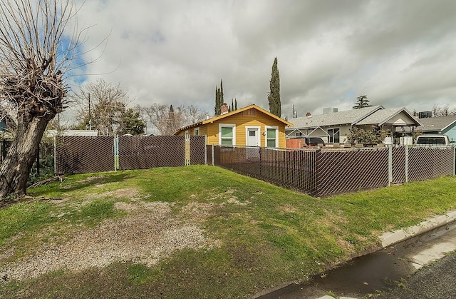 view of yard featuring a fenced backyard